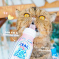 Load image into Gallery viewer, "Cat enjoying ZEAL® lactose-free pet milk"
